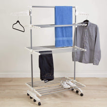Load image into Gallery viewer, New heavy duty 3 tier laundry rack stainless steel clothing shelf for indoor outdoor use with tall bar best used for shirts towels shoes everyday home