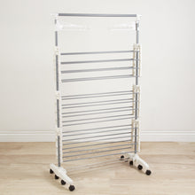 Load image into Gallery viewer, Order now heavy duty 3 tier laundry rack stainless steel clothing shelf for indoor outdoor use with tall bar best used for shirts towels shoes everyday home
